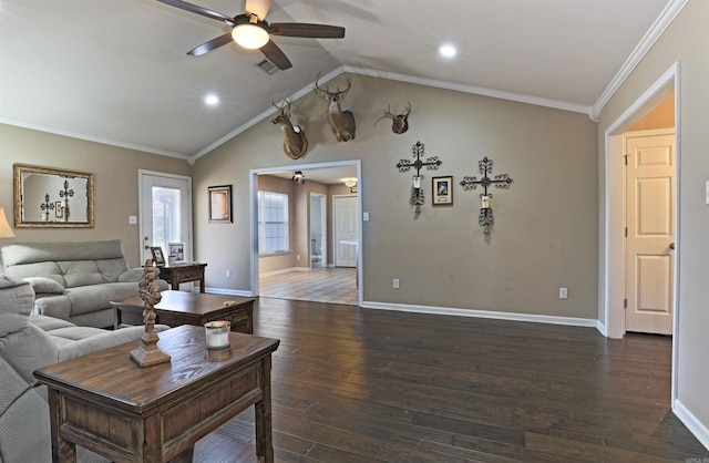 living room featuring dark hardwood / wood-style floors, vaulted ceiling, ceiling fan, and ornamental molding