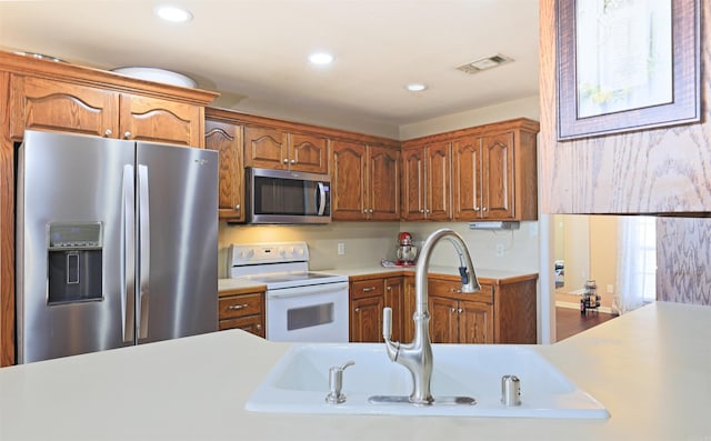 kitchen featuring sink and stainless steel appliances