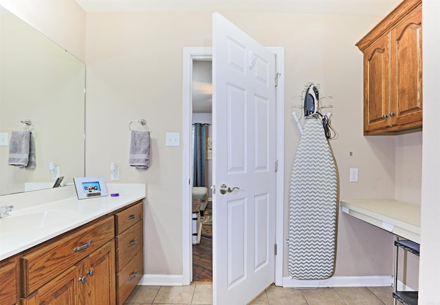 bathroom featuring tile patterned floors and vanity