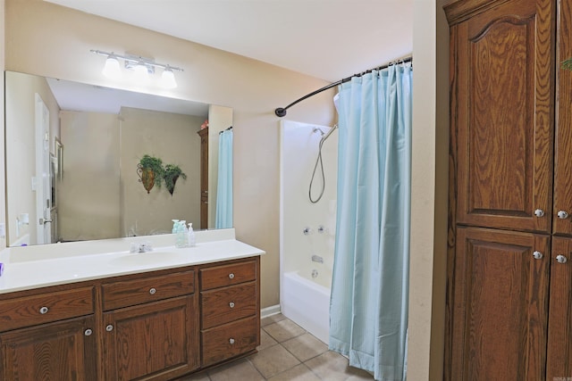 bathroom with tile patterned floors, vanity, and shower / tub combo