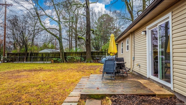 view of yard featuring a wooden deck