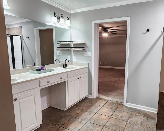 bathroom with ceiling fan, crown molding, and vanity