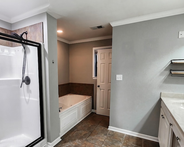 bathroom featuring crown molding, vanity, and independent shower and bath