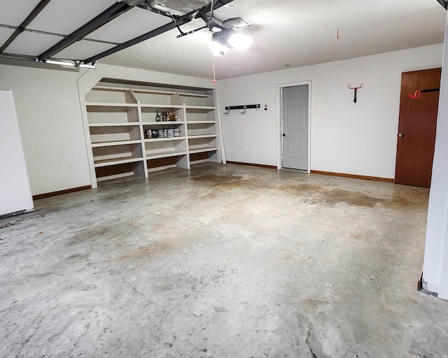 garage featuring white refrigerator