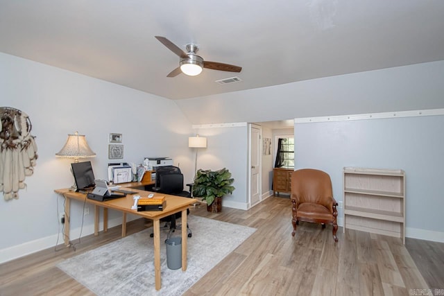 office with ceiling fan, vaulted ceiling, and light wood-type flooring