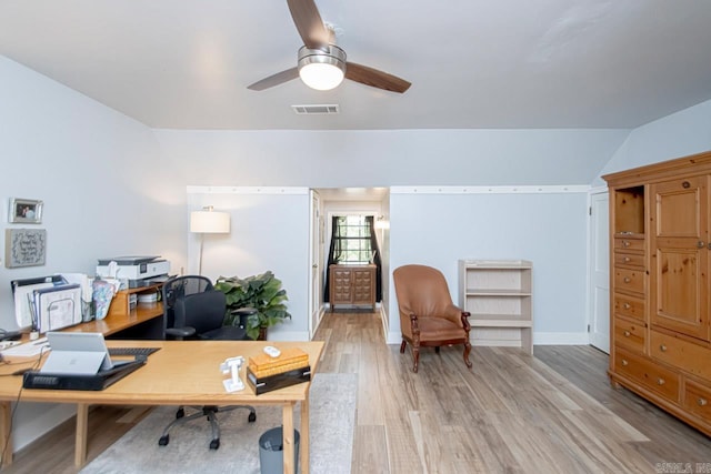 office with light wood-type flooring, ceiling fan, and lofted ceiling