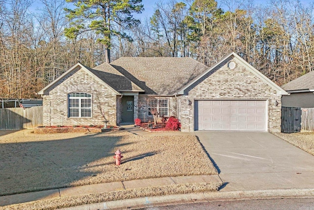 ranch-style home with a garage