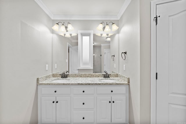 bathroom with vanity and ornamental molding