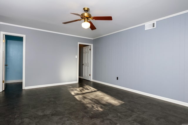 spare room featuring crown molding and ceiling fan