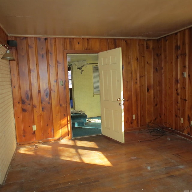 unfurnished room featuring wood-type flooring