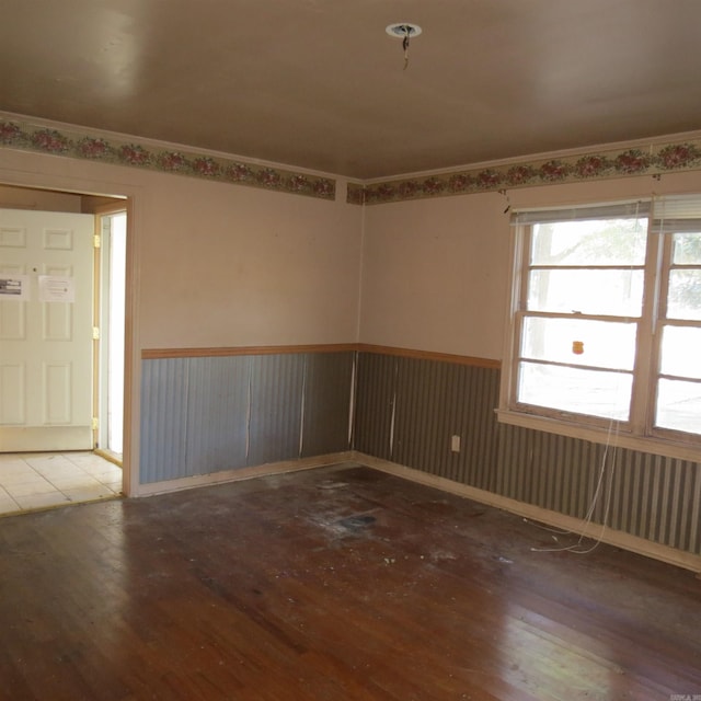 unfurnished room featuring hardwood / wood-style floors