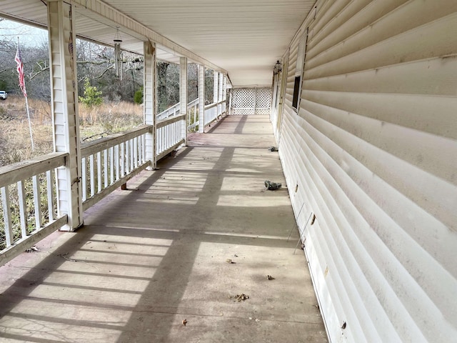 wooden deck featuring covered porch