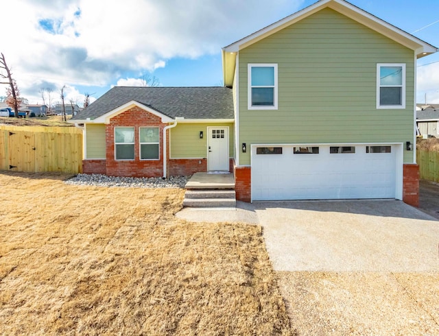 view of front of home with a garage