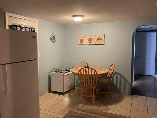 view of tiled dining space