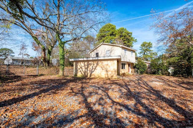 view of property exterior with a garage