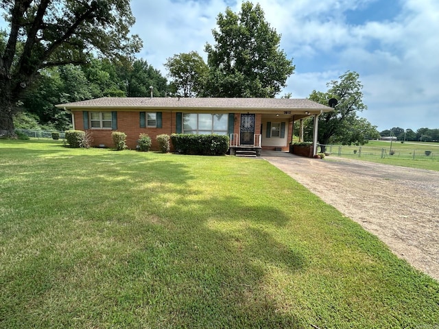 ranch-style house with a front yard