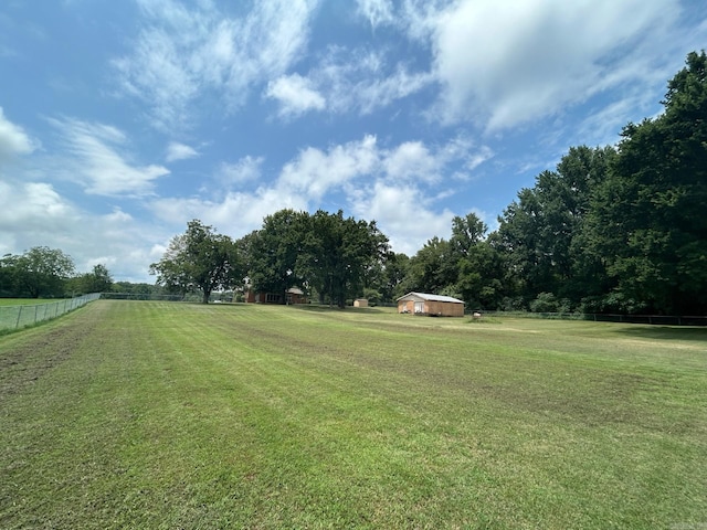 view of yard with a rural view