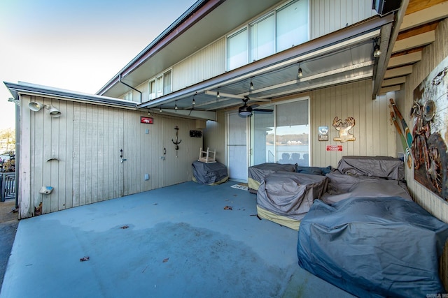 view of patio with ceiling fan