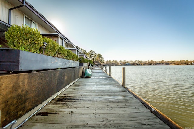 view of dock with a water view