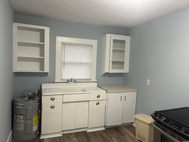 kitchen with electric water heater, dark wood-type flooring, white cabinets, range with electric cooktop, and a textured ceiling