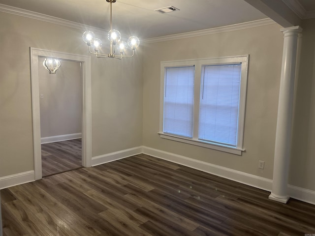 unfurnished room with dark hardwood / wood-style flooring, an inviting chandelier, ornate columns, and crown molding