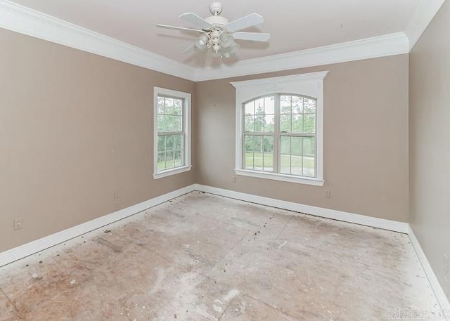 spare room featuring crown molding and ceiling fan