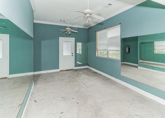 entryway with ceiling fan, concrete flooring, and crown molding