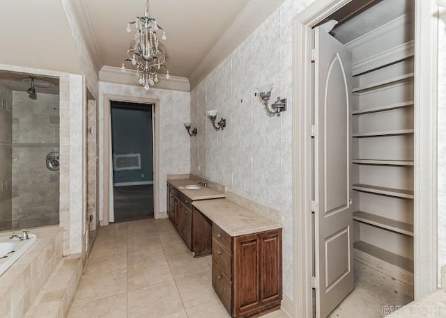 bathroom with vanity, tile patterned flooring, separate shower and tub, built in features, and a chandelier