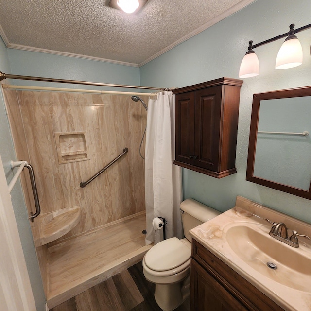 bathroom with a textured ceiling, a shower with curtain, crown molding, and hardwood / wood-style floors