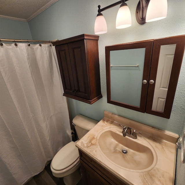 bathroom featuring crown molding, a textured ceiling, toilet, vanity, and a shower with shower curtain