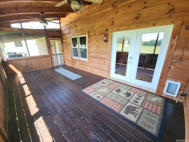 wooden terrace with ceiling fan and french doors