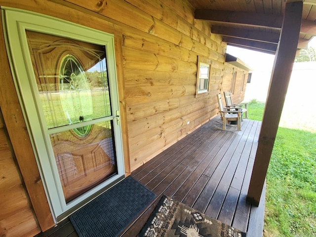 doorway to property with a porch