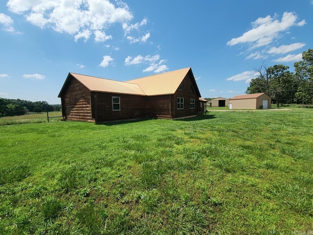 view of home's exterior featuring a lawn