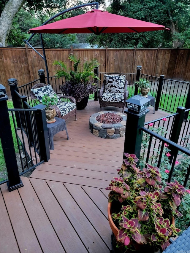 deck featuring a fire pit