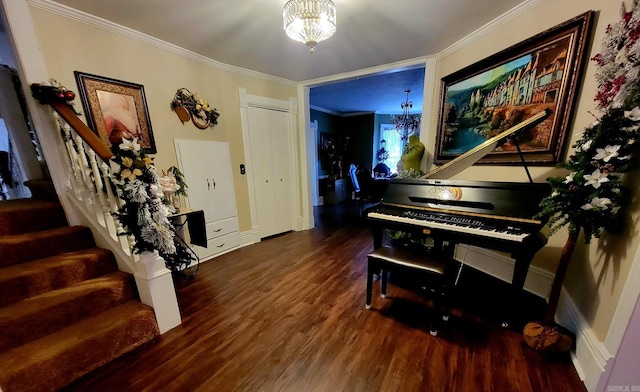 miscellaneous room featuring dark hardwood / wood-style flooring, a chandelier, and ornamental molding