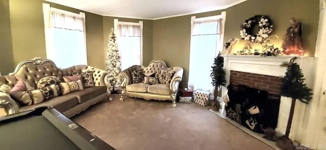 living area with carpet, a fireplace, and crown molding