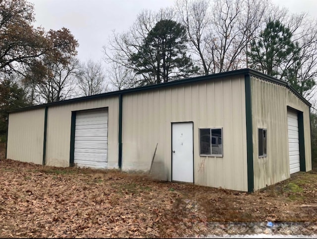 view of outdoor structure with a garage