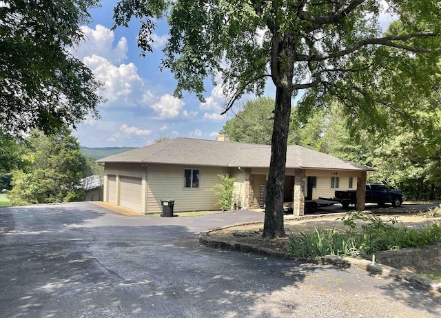 view of property exterior featuring a garage