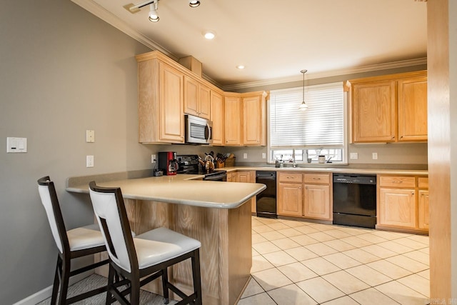 kitchen featuring light brown cabinets, black appliances, decorative light fixtures, kitchen peninsula, and a breakfast bar area