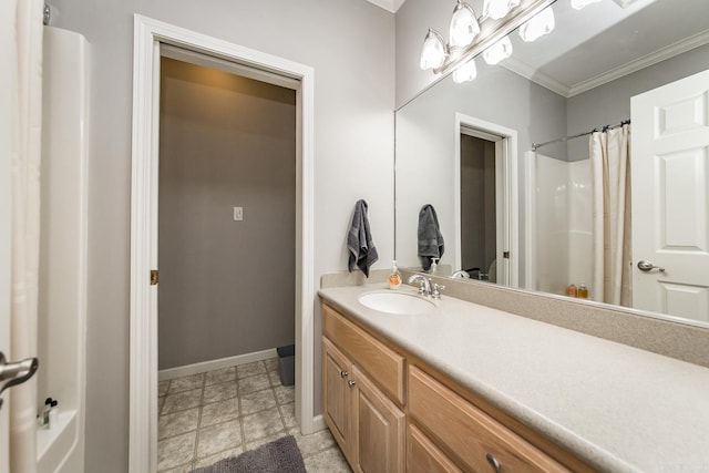 bathroom featuring a shower with shower curtain, vanity, and crown molding