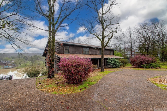 view of side of property featuring a water view