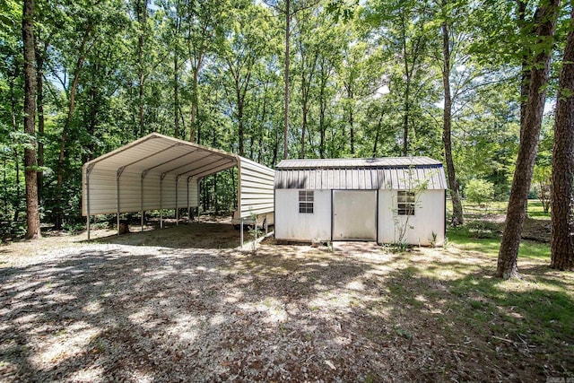 view of outbuilding with a carport