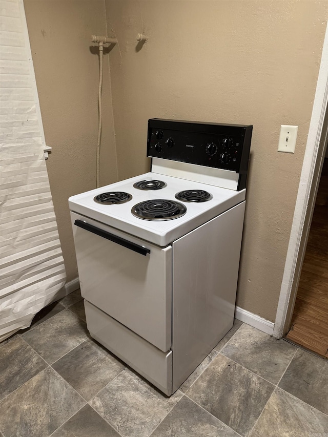 kitchen with white range with electric stovetop