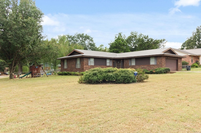 ranch-style house with a playground, a front lawn, and a garage