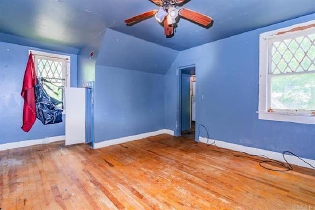 bonus room featuring ceiling fan, lofted ceiling, and hardwood / wood-style flooring