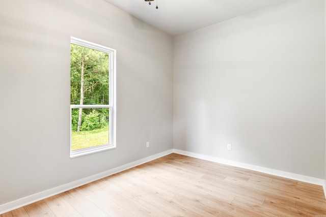 unfurnished room featuring light hardwood / wood-style floors