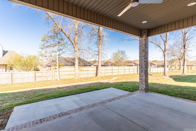 view of patio / terrace featuring ceiling fan