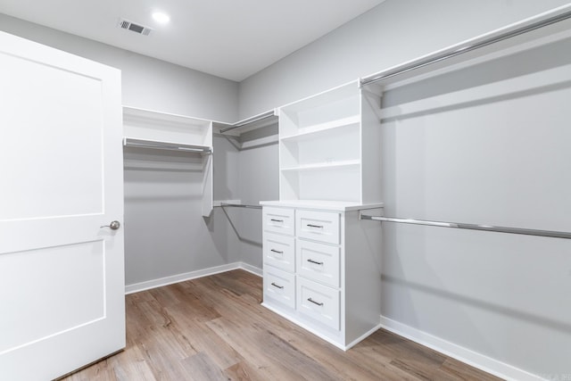 walk in closet featuring light wood-type flooring