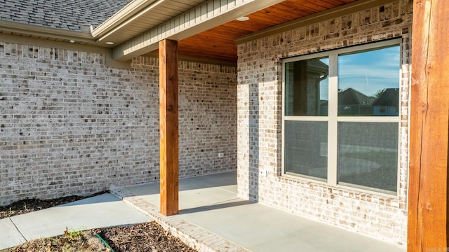 property entrance with a patio