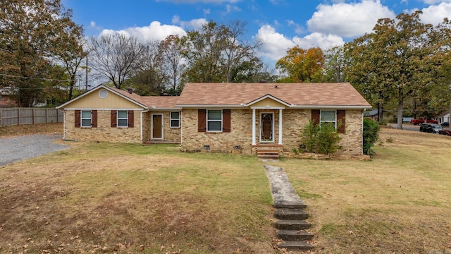 ranch-style house with a front yard